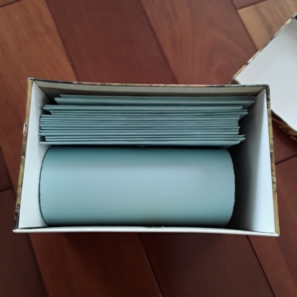 Box with paper and envelops